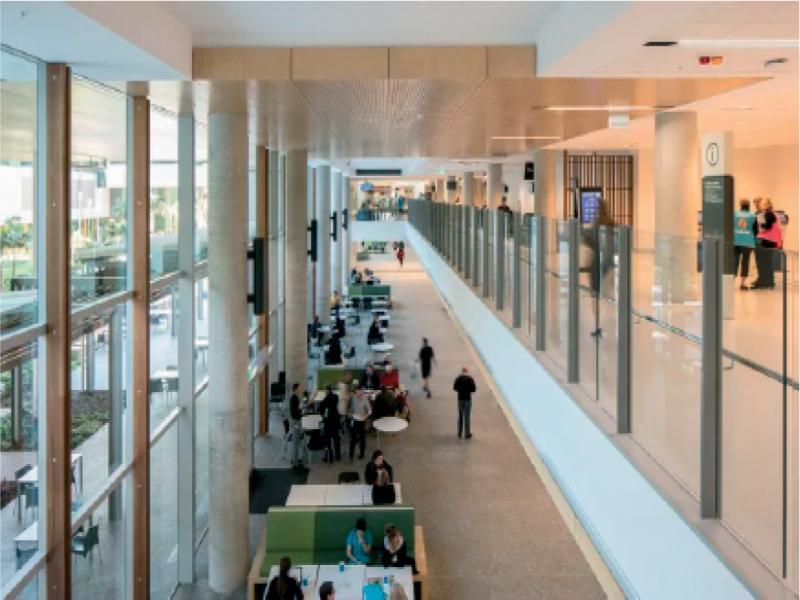 Internal public space unit in the form of a “pedestrian street” at Sunshine Coast University Hospital, Birtinya, Australia. Source: https://media2.architecturemedia.net/site_media/media/cache/15/7f/157f7fe6c0eea55ccf9596816456a2c8.jpg