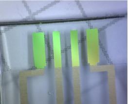 Tetrapolar electrode made from a CD-R. The dimension of the inner electrodes is 100 μm. For electrical characterization of the electrodes, measurements in bulk electrolytes were done with the leads passivated using Tesa tape (Bayersdorf AG, Hamburg, Germany).