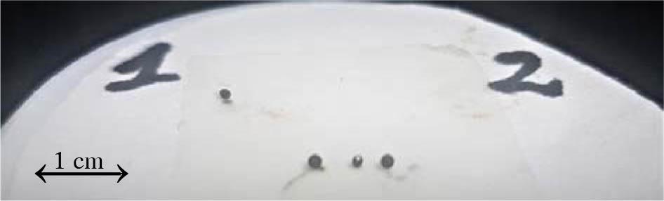 LA stand with SiC (outer) and Zr (middle) spheres. Numbers allow positioning of the table in relation to the beam.