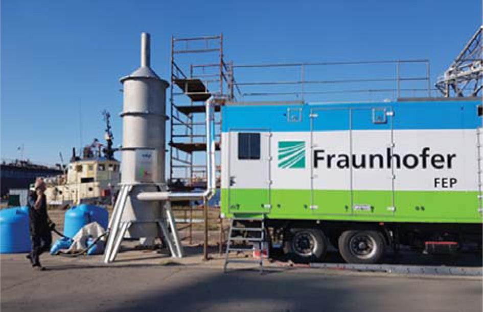 Photo of EBFGT installation at Riga Shipyard. Mobile accelerator unit (right) and wet scrubber (left).