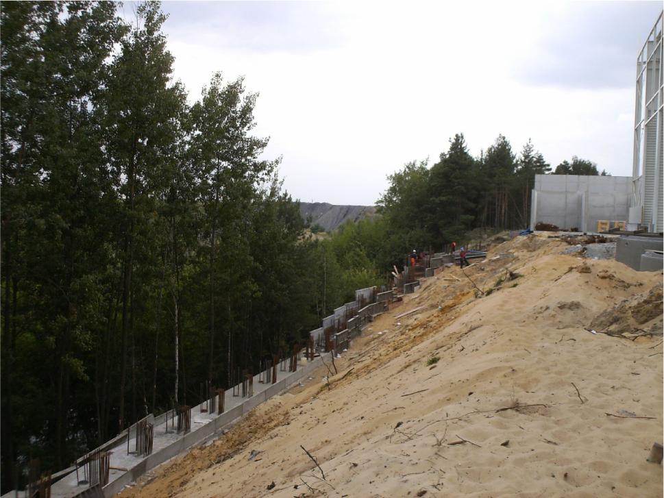 Embedded wall under construction.