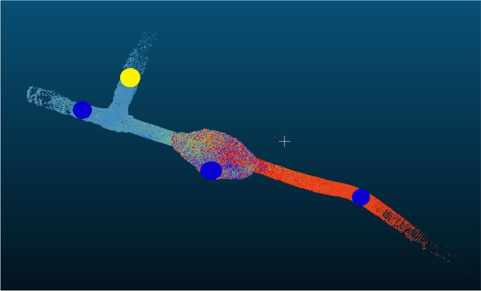 Sample scan showing undesirable arrangement of measurement points (blue circles). The yellow circle marks an additional point on the crosscuts, which have also been measured to correct the unfavourable geometry of the reference points.