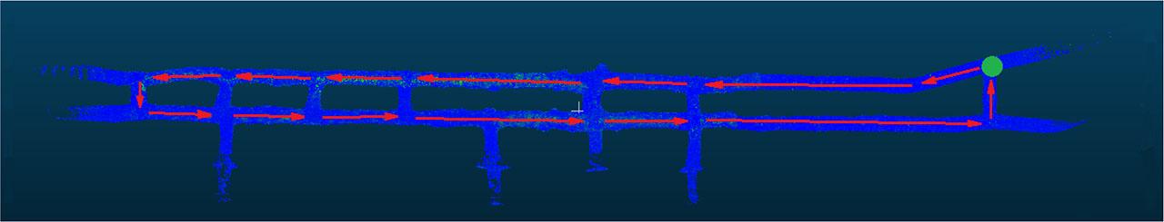 Preparatory mine excavation with an unfavourable geometry. Both the starting and finishing points of the scan (green circle) and the incorrectly planned scanning route (red arrows) are marked.