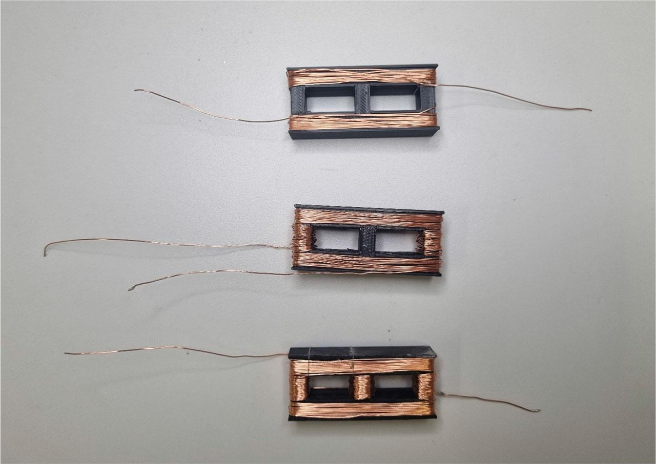 Coil V1, V2, and V3 designs using standalone implant geometry.