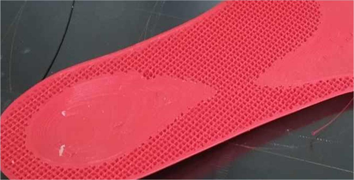 Cross-section through an insole printed on a 3D printer. Visible internal openwork structure ensuring the softness of the insole. (source: own research)