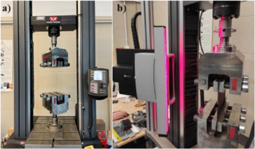 a) INSTRON tensile strength machine, b) extensometer (own photography).