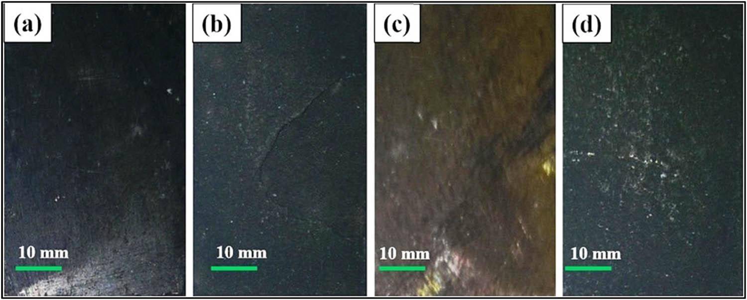 Macrographs of specimens in dry air at 850°C. (a) Uncoated 304L. (b) Coated 304L. (c) Uncoated 316L. (d) Coated 316L.