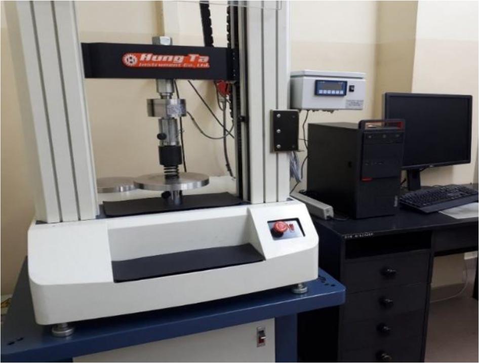 The testing machine used to spring axial stiffness researches